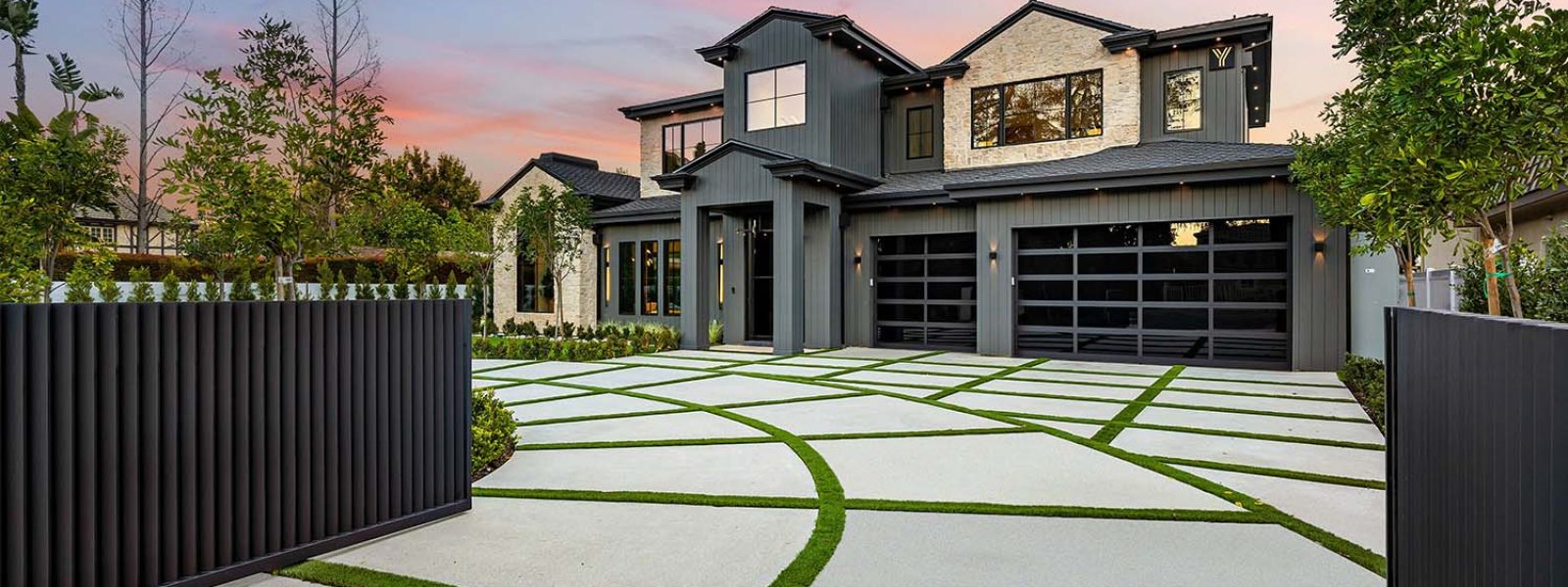modern-house-with-designed-driveway-at-sunset-WG6U2AR.jpg